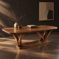 Rectangular desk on arched loop legs joined by a flat wood base, three-quarter view showing the grain