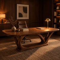 Rectangular desk on arched loop legs joined by a flat wood base in an evening home office with walnut wall paneling