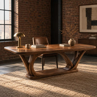 Rectangular desk on arched loop legs joined by a flat wood base in an industrial loft home office with exposed brick
