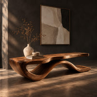 Low bench with a long slab seat on a flowing ribbon shaped base, three-quarter view showing the grain