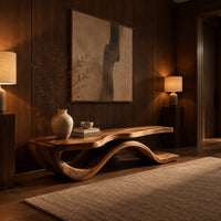 Low bench with a long slab seat on a flowing ribbon shaped base in an evening entryway with walnut wall paneling
