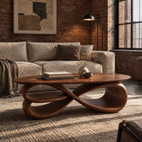 Oval coffee table over layered looping ribbons shaped like an infinity symbol in an industrial loft living room with exposed brick