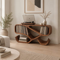 Ribbon frame record console with two open end bays and curled feet in a Scandinavian living room with white walls