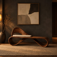 Ribbon loop bench with an arched backrest and a cream cushion in a dark entryway at golden hour