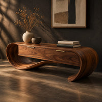 Looping wooden bench with a ribbon shaped frame and two drawers, three-quarter view showing the grain