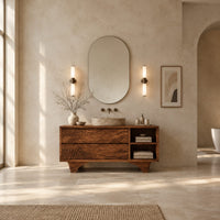 Bathroom vanity with rippled carved fronts and an arched base in a bright open plan bathroom