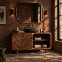 Bathroom vanity with ripple carved doors, open shelves and short tapered feet in an industrial loft bathroom with exposed brick