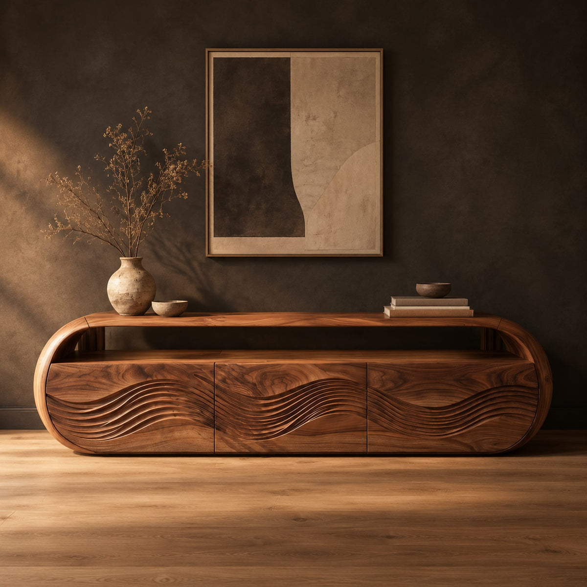 Capsule shaped tv stand with three wave carved front panels in a dark studio against a charcoal plaster wall