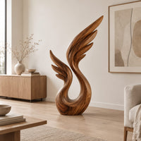 Wing sculpture with layered feathers rising from an open loop in a Scandinavian living room with white walls