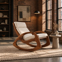 Rocking chair with looped side frames, curved runners and long cushions in an industrial loft living room with exposed brick