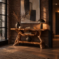 Console table with a branch root base, two slab tops and two shelves in an industrial loft entryway with exposed brick