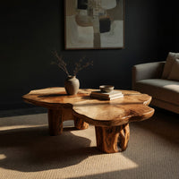 Free form live edge low table on stump legs, three-quarter view showing the grain