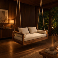 Wooden swing hung from four thick ropes with a low solid wood frame in an evening porch with walnut wall paneling