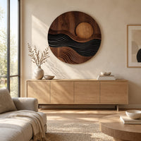 Round carved wall art with a sun disc over layered waves above a light oak sideboard in daylight