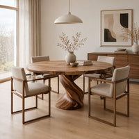 Round dining table on a twisted spiral pedestal base in a Scandinavian dining room with white walls
