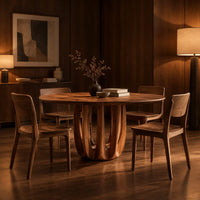 Round dining table on a pedestal made of arched wood columns in an evening dining room with walnut wall paneling