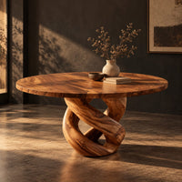 Round dining table with a twisted loop pedestal base, three-quarter view showing the grain
