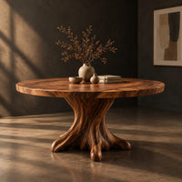 Circular dining table with a root shaped pedestal base, three-quarter view showing the grain