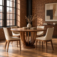 Round dining table on a pedestal of tall arched wooden slats in an industrial loft dining room with exposed brick