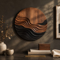 Detail of round wall art with stepped wave ridges in two tones beside wood, brass and linen samples