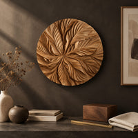 Detail of circular wood disc carved with overlapping leaves that radiate from the center beside wood, brass and linen samples
