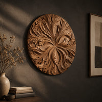 Round wood wall art with swirling carved petals in relief, three-quarter view showing the carved depth
