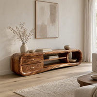 Capsule tv stand with drawers and a round open cubby in a Scandinavian living room with white walls