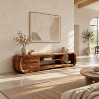 Capsule tv stand with drawers and a round open cubby in a bright open plan living room