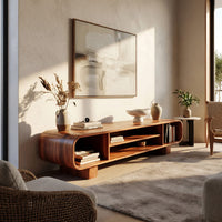 Rounded TV console with three open bays in an open plan space in daylight