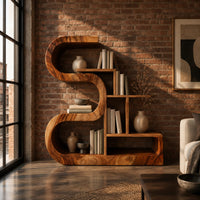 Wooden bookshelf with a thick s shaped curve and stepped open shelves in an industrial loft living room with exposed brick