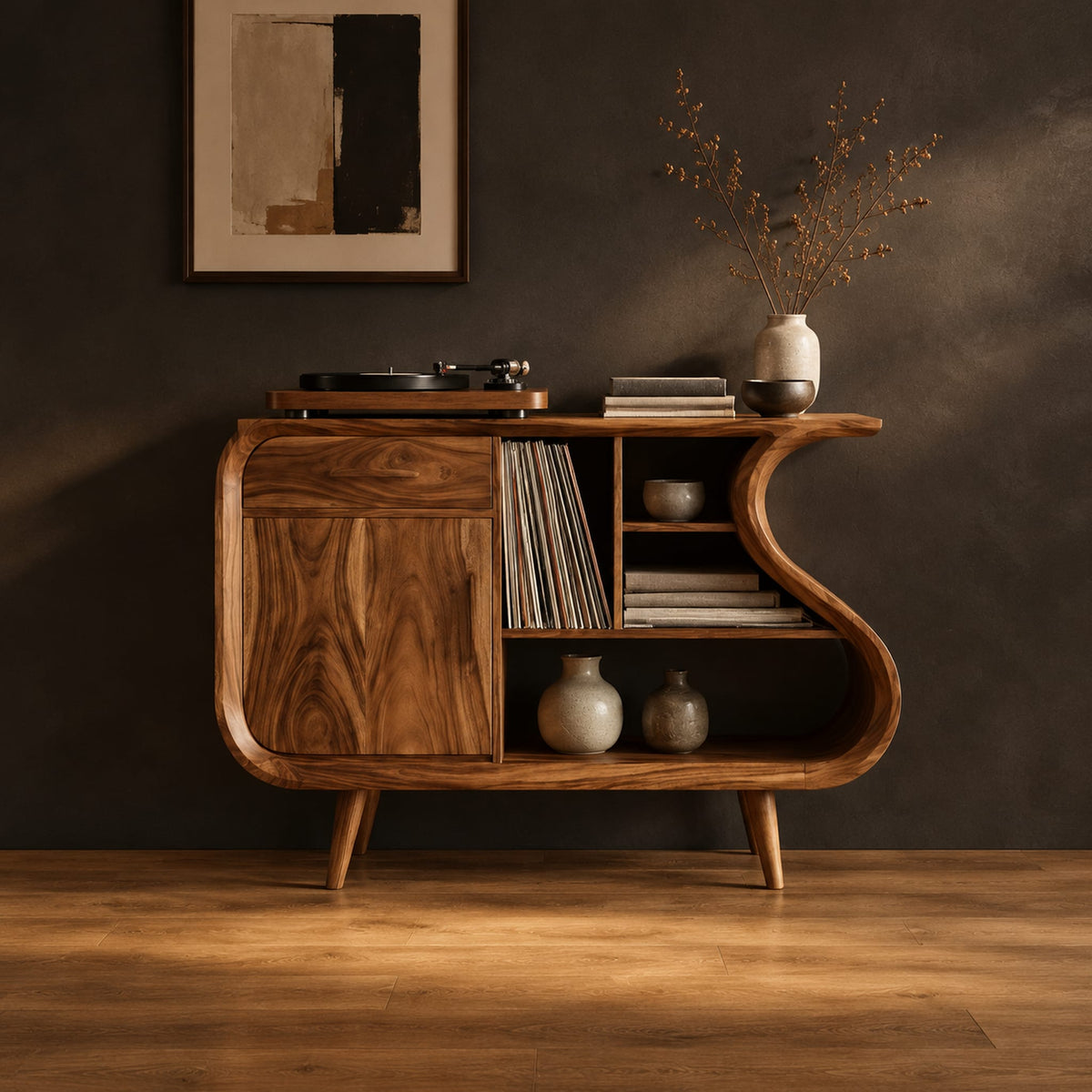 Record player stand with an s shaped side, one door and open shelves in a dark studio against a charcoal plaster wall