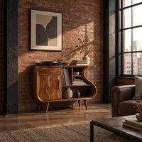 Record player stand with an s shaped side, one door and open shelves in an industrial loft living room with exposed brick