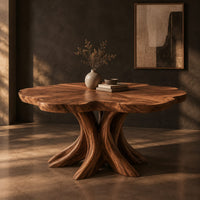 Dining table with a scalloped edge top and a flared branching pedestal, three-quarter view showing the grain