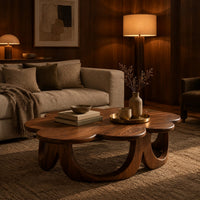 Scalloped coffee table on a ring of arched wooden panels in an evening living room with walnut wall paneling