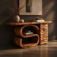 Console table with a large scroll base and a wave carved side column, three-quarter view showing the grain