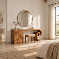 Makeup vanity desk with a spiral scroll leg and a three drawer cabinet in a bright open plan bedroom
