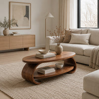 Oval coffee table with scrolled sides and a low shelf in a Scandinavian living room with white walls