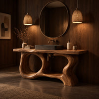 Open frame vanity with a freeform slab top and a sculpted looping base in an evening bathroom with walnut wall paneling