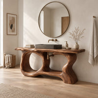 Open frame vanity with a freeform slab top and a sculpted looping base in a Scandinavian bathroom with white walls