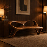 Wood bench with two oval back openings and looped legs in an evening entryway with walnut wall paneling