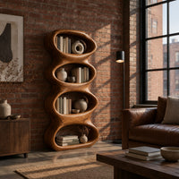 Tall sculpted bookshelf with four stacked oval openings in an industrial loft living room with exposed brick