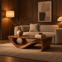 Rectangular coffee table with a thick top over a swooping open loop base in an evening living room with walnut wall paneling