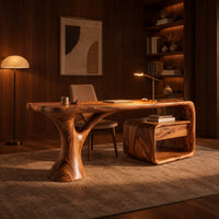 Sculpted desk with a tree trunk leg and a loop frame side unit in an evening home office with walnut wall paneling