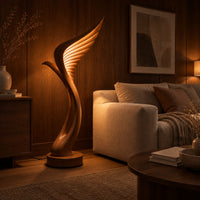 Tall floor lamp shaped like a ribbed feather wing on a round wooden base in an evening living room with walnut wall paneling