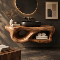 Corner detail of floating bathroom vanity shelf with sculpted openings and a flat top beside wood, brass and linen samples