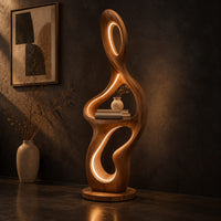 Sculpted floor lamp with glowing oval cutouts and a mid level shelf, three-quarter view showing the grain