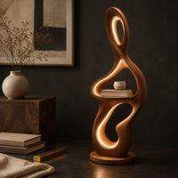 Corner detail of sculpted floor lamp with glowing oval cutouts and a mid level shelf beside wood, brass and linen samples