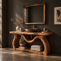 Bathroom vanity with sculpted wavy legs and an open lower shelf, three-quarter view showing the grain