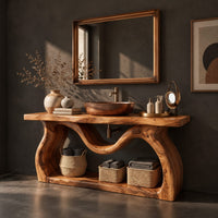 Corner detail of bathroom vanity with sculpted wavy legs and an open lower shelf beside wood, brass and linen samples