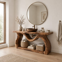 Bathroom vanity with sculpted wavy legs and an open lower shelf in a Scandinavian bathroom with white walls